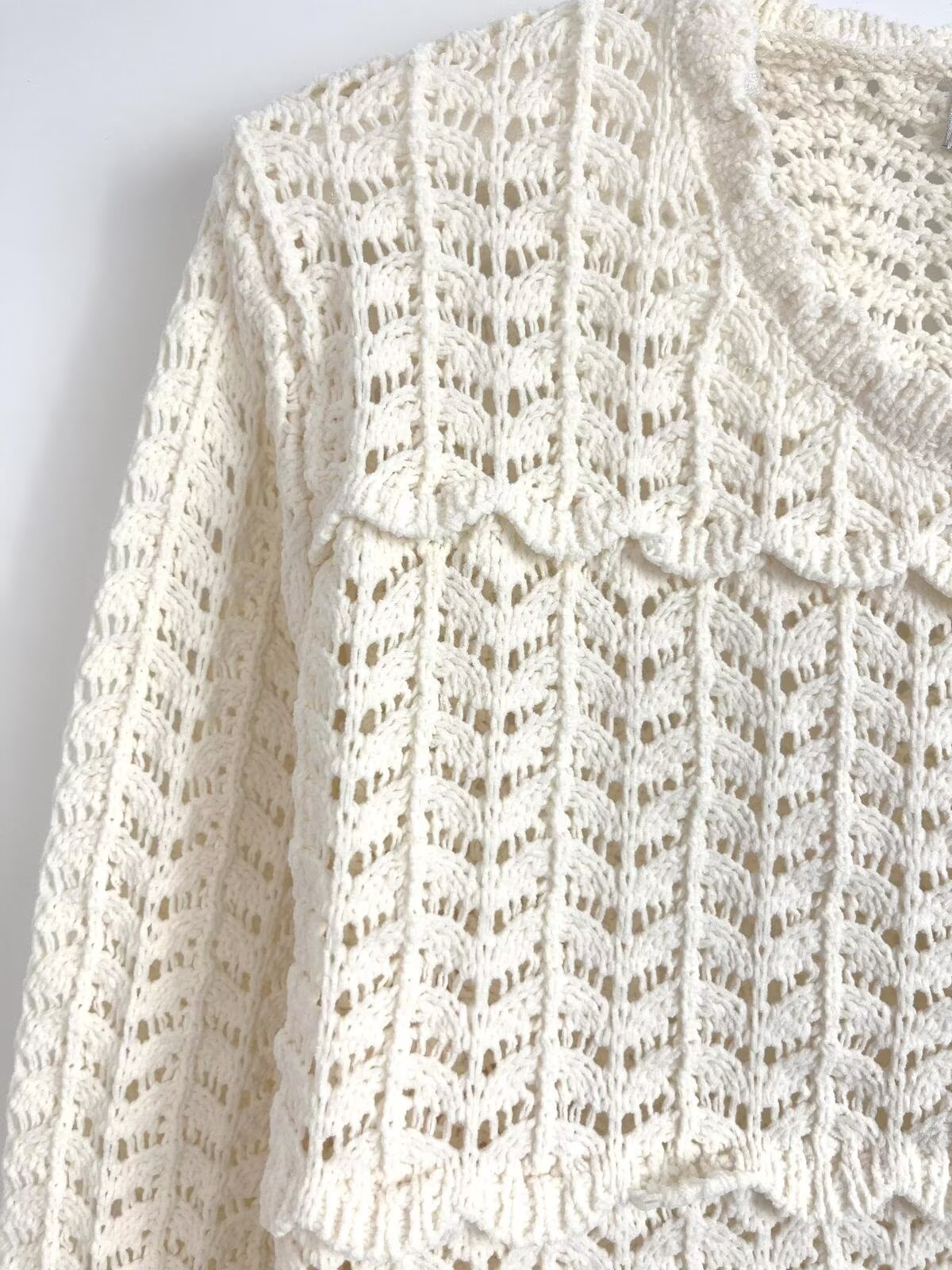 Women's new fashion O Neck long sleeved patchwork hem knitted cardigan