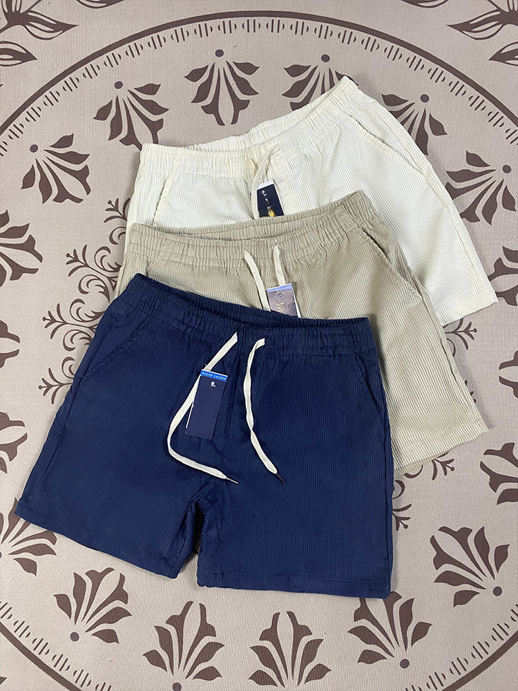 Men and women with the same new Joker couple style corduroy fabric elastic waist casual shorts.