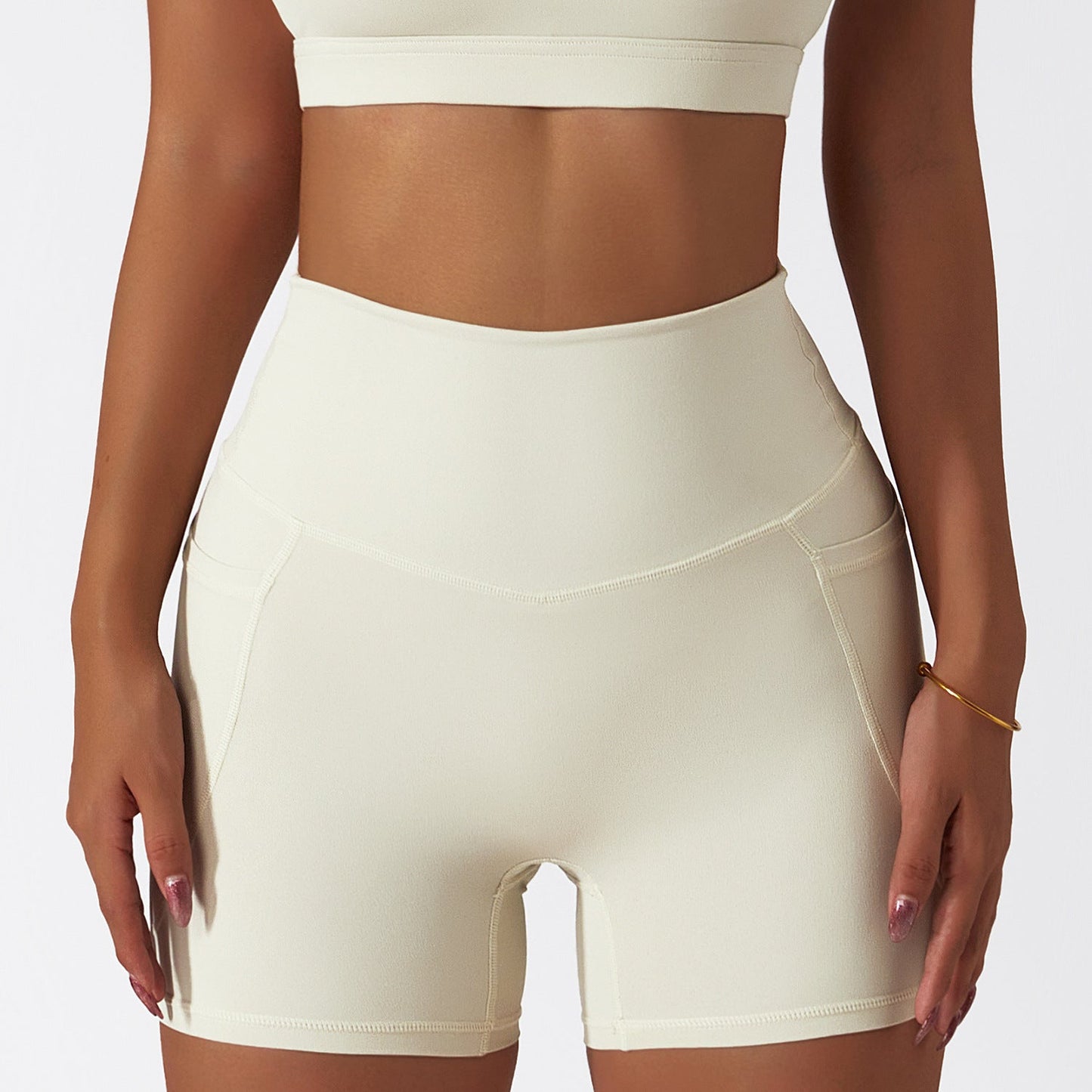 Women's new quick-drying nude sports inclined one-shoulder back yoga bra+pocket breathable fitness shorts