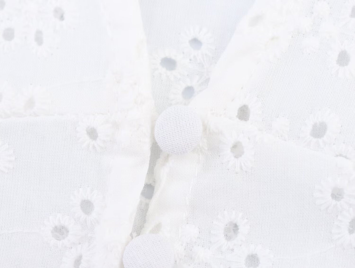 Women's hollowed out embroidered V-neck shirt