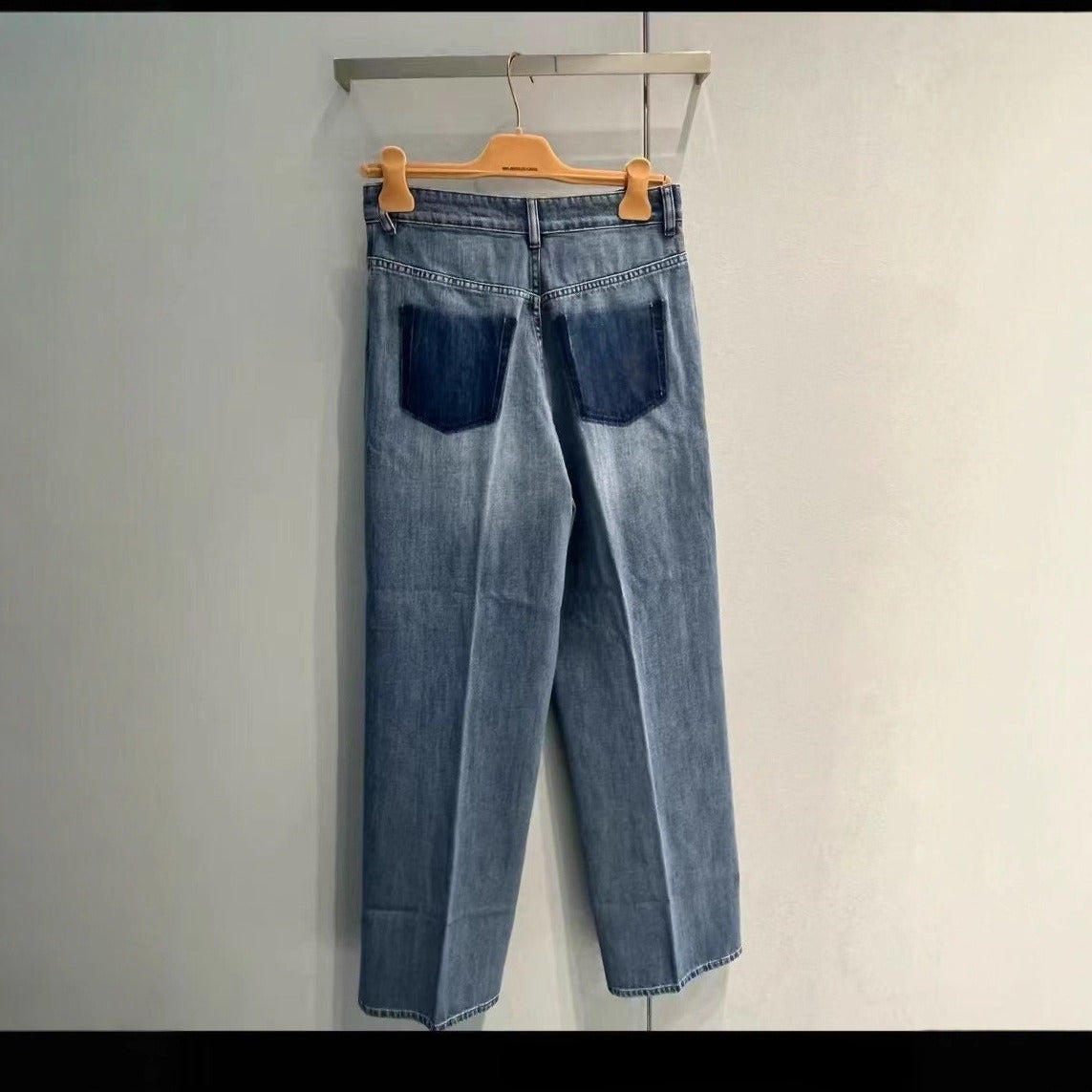 Women's new Joker fake pocket fashion old washed blue jeans Joker high waist loose straight pants.