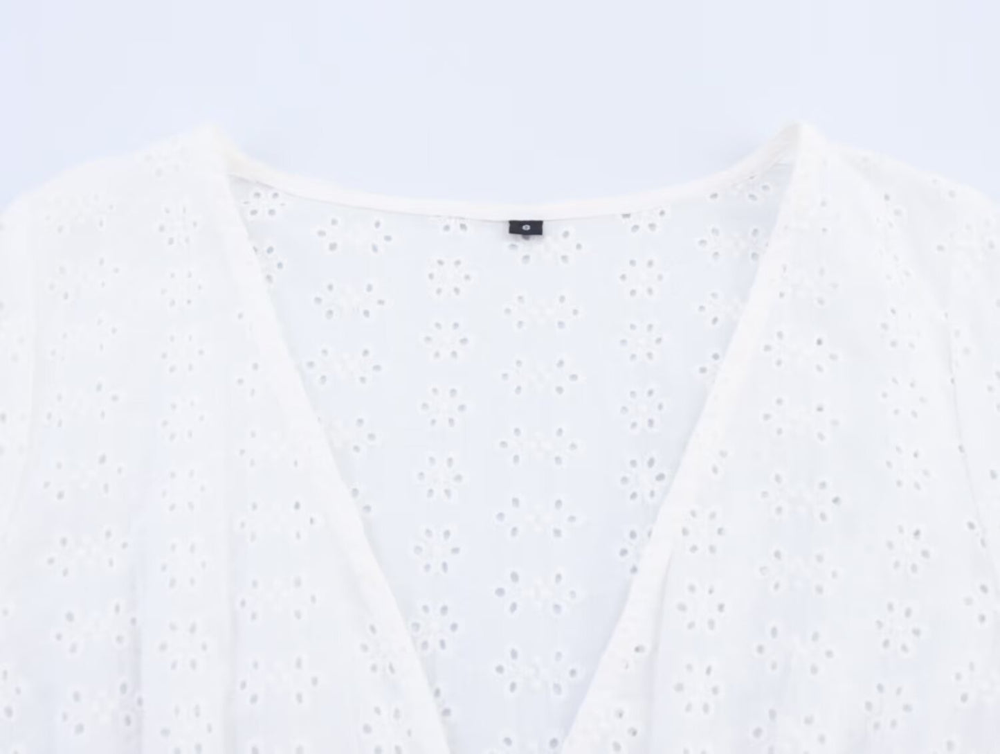 Women's hollowed out embroidered V-neck shirt