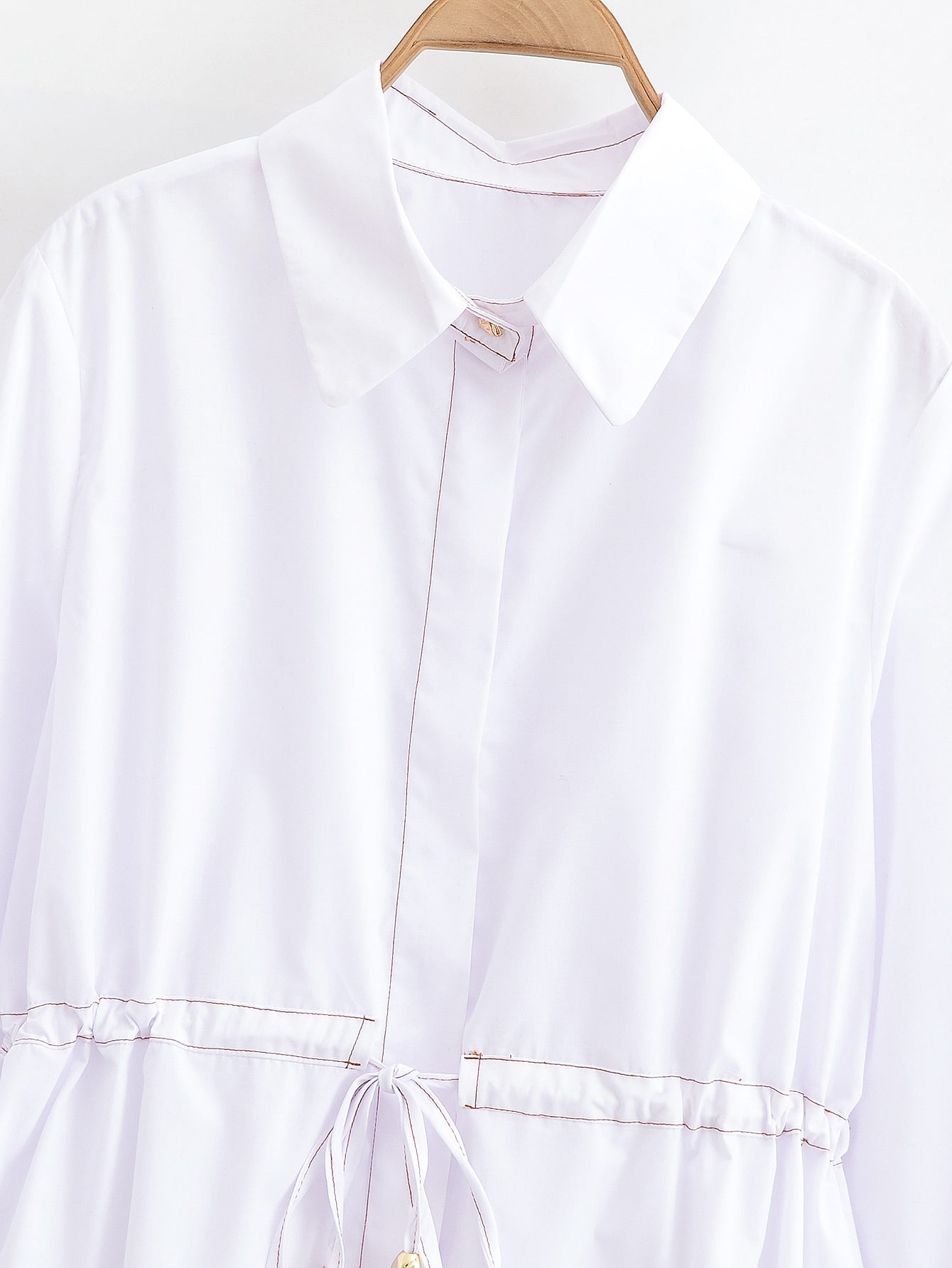 Women's chic fashion with drawstring short long sleeved shirt