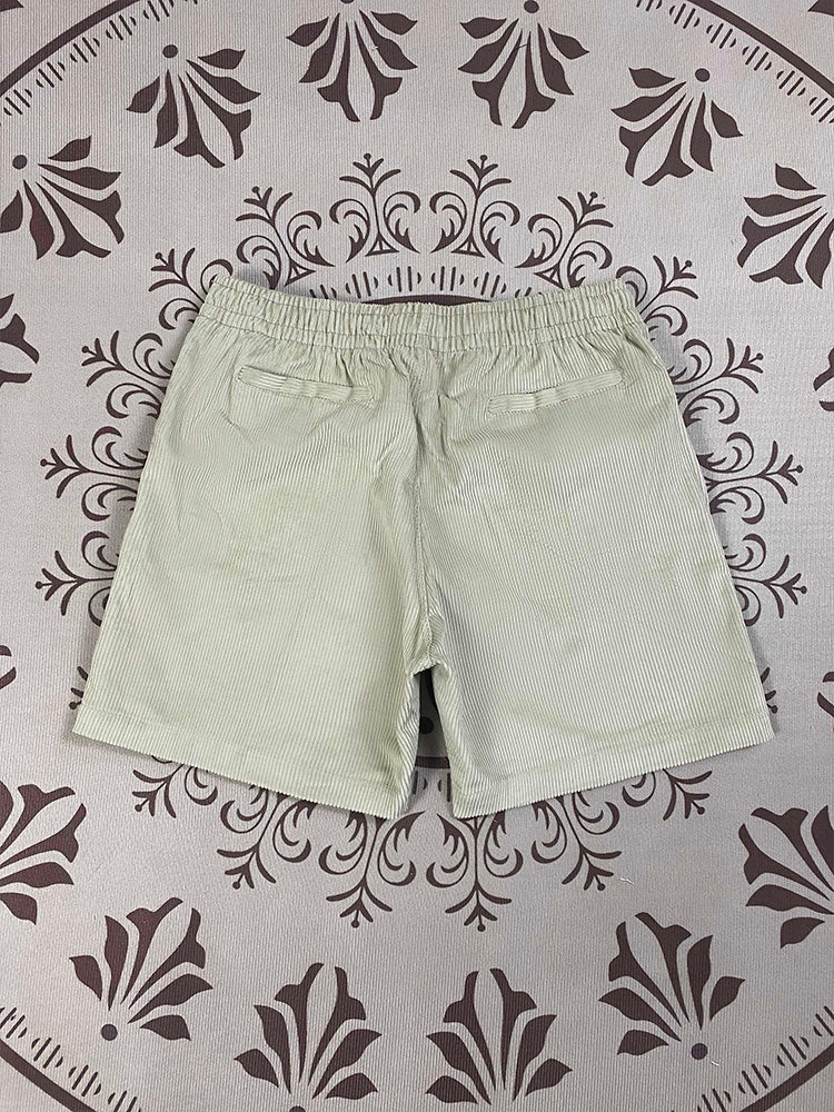Men and women with the same new Joker couple style corduroy fabric elastic waist casual shorts.