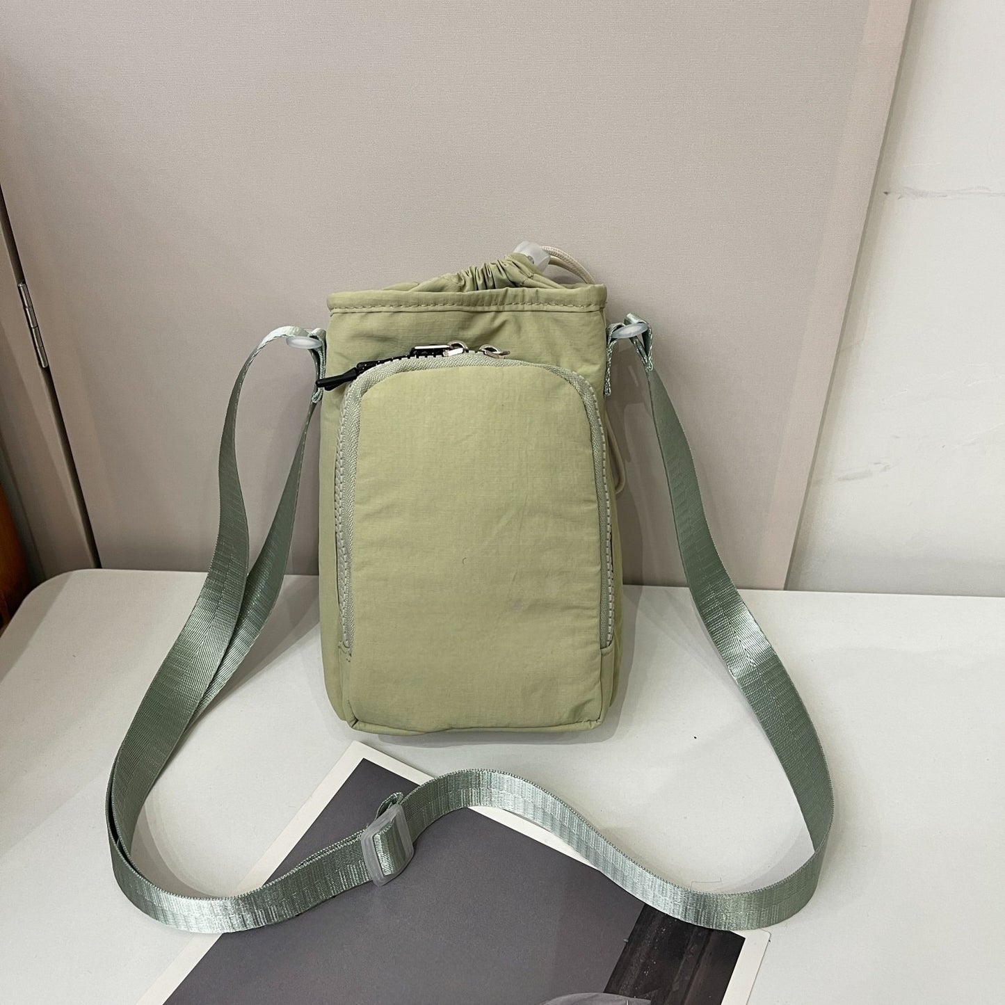 Men's and Women's Leisure Versatile Sports Adjustable Shoulder Strap Multifunctional Water Cup Mobile Phone Messenger Bag