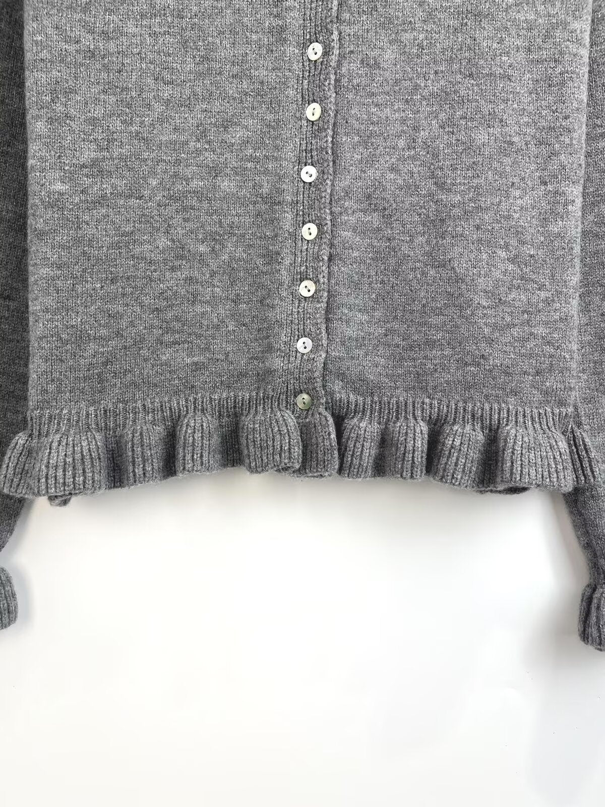 Women's new fashion layered decoration lapel long sleeved knitted cardigan