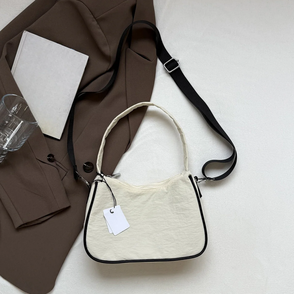 2025 shoulder slung jiaozi waterproof leisure bag